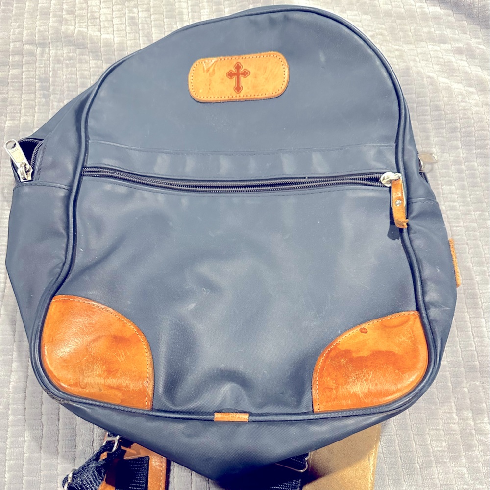 Navy Jon Hart backpack in used condition